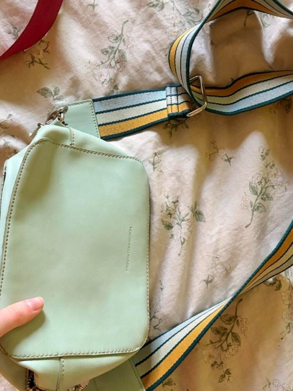 French Connection mint green crossbody bag with striped strap
